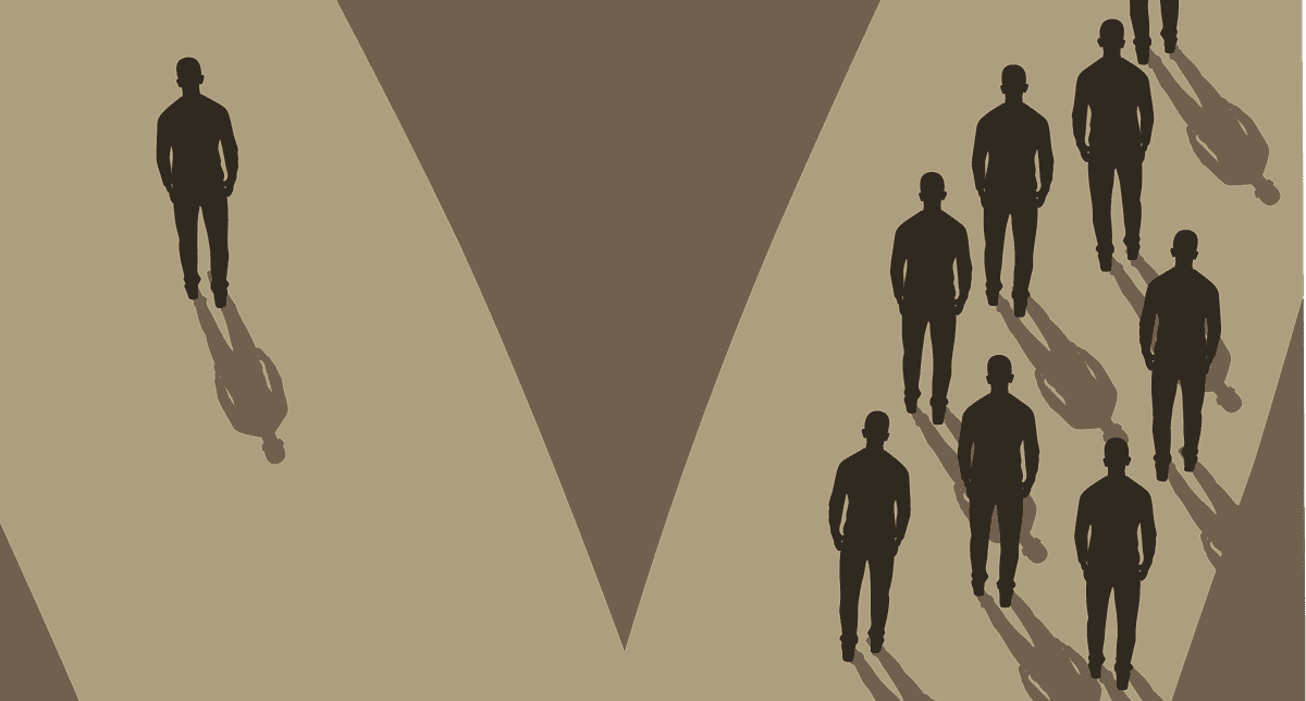One figure standing separate from a group of figures standing together One figure standing separate from a group of figures standing together